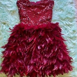 Red sequined and feather dress